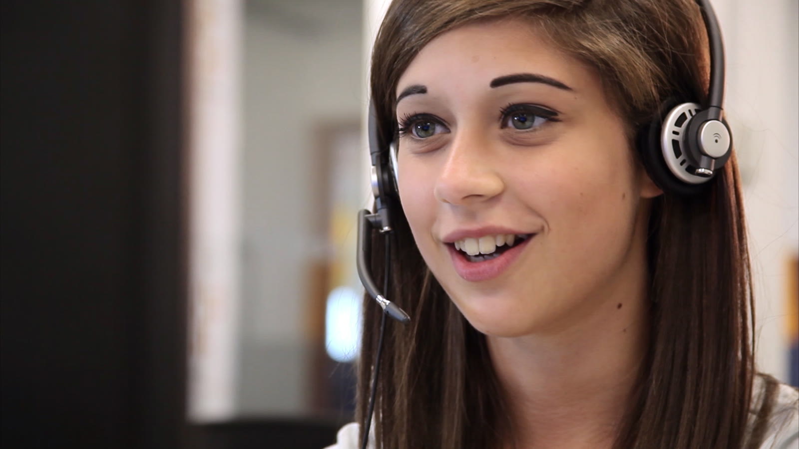 Access Prepaid, a call centre agent wearing a headset